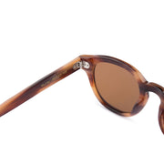 Mari & Clay, Australian sustainable sunglasses label. The Murray style is a round design available in black, sand (clear), tortoiseshell, and caramel bio-acetate frames. All Mari & Clay sunglasses are fitted with polarised lenses. The design is unisex and good for oval, square and heart-shaped faces.